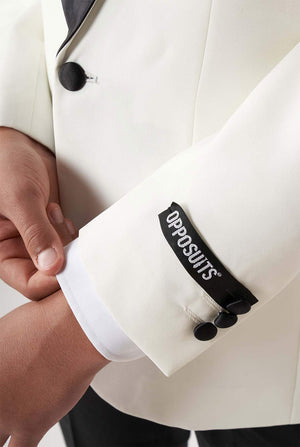 Kid wearing white and black tuxedo