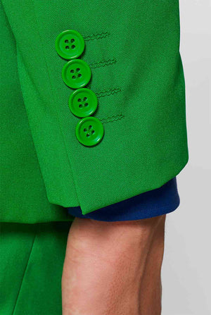 Man wearing green men's suit and dark blue dress shirt