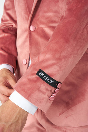 Man wearing pink velvet tuxedo, sleeve close up
