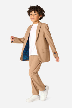 Kid wearing a stylish light brown/ beige suit with a white dress shirt, looking away from the camera. Perfect formal outfit for boys' special occasions, weddings, and parties.