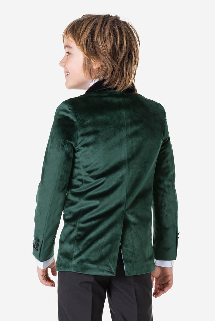 Boy wearing green velvet Christmas dinner jacket