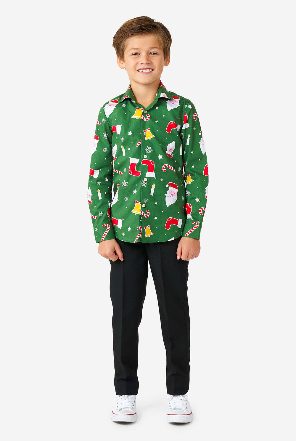 Kid wearing green Christmas shirt with Christmas icons