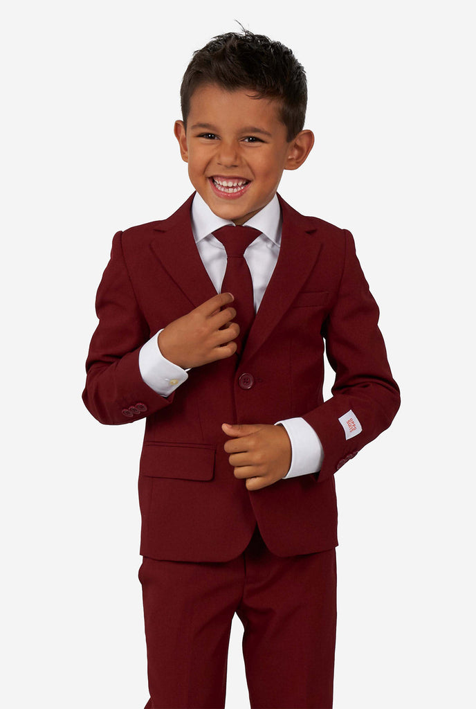 Kid wearing a burgundy red suit for boys