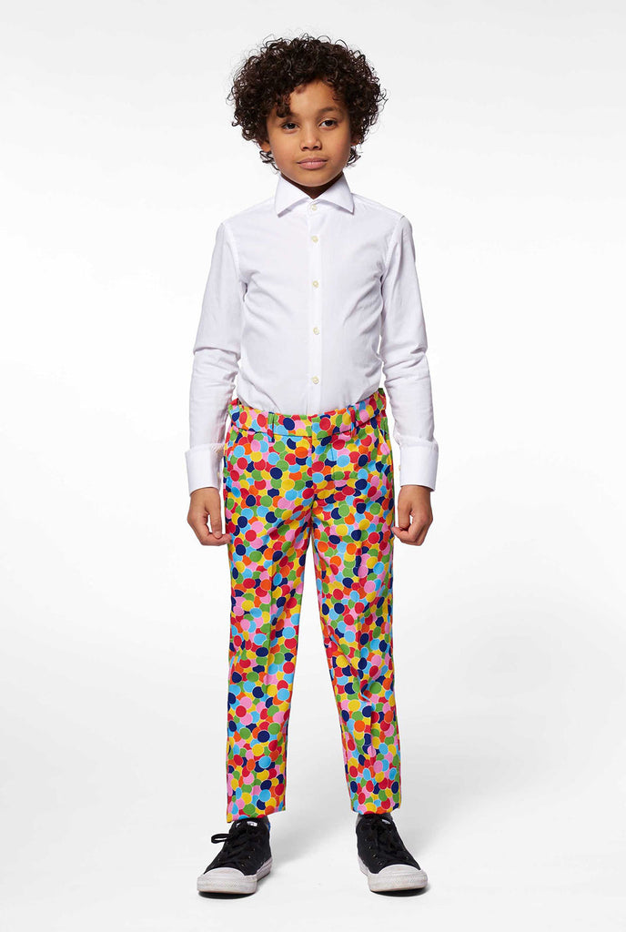 Multi colored confetti print boys suit worn by boy