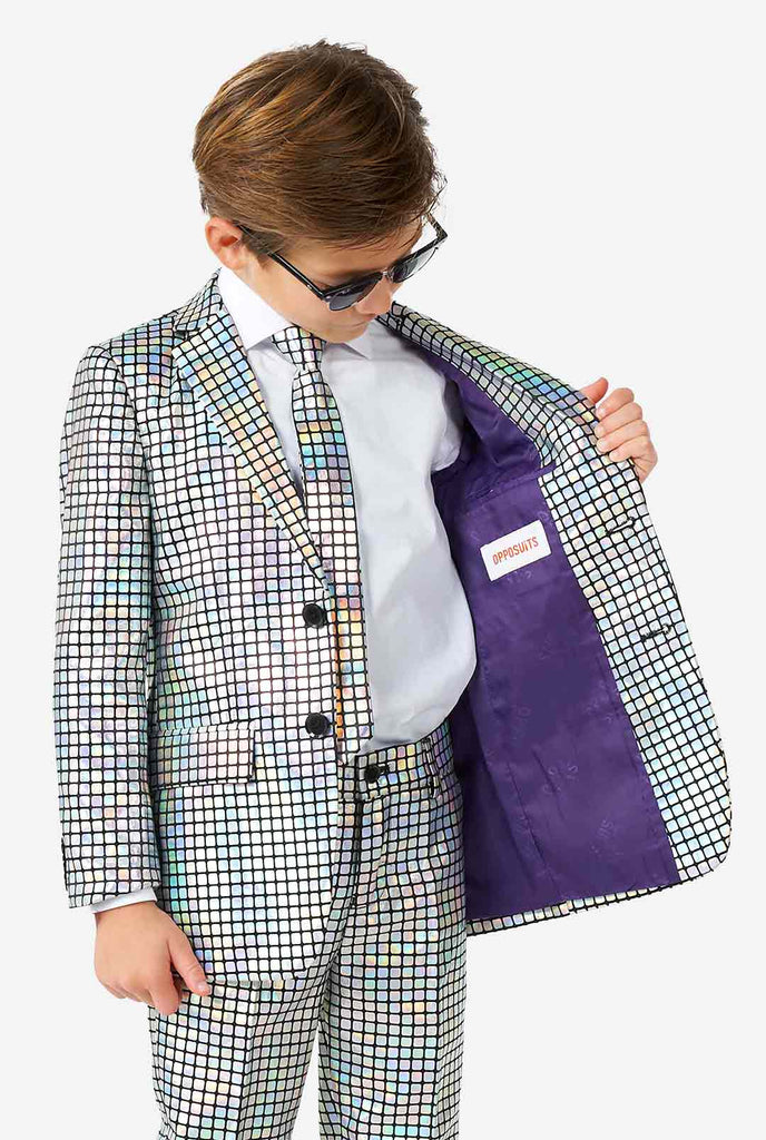 Boy wearing disco ball mirror suit