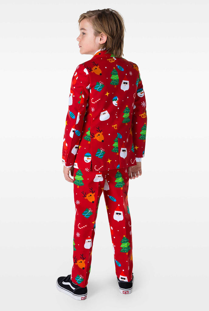 Kid wearing red Christmas suit with Christmas icons