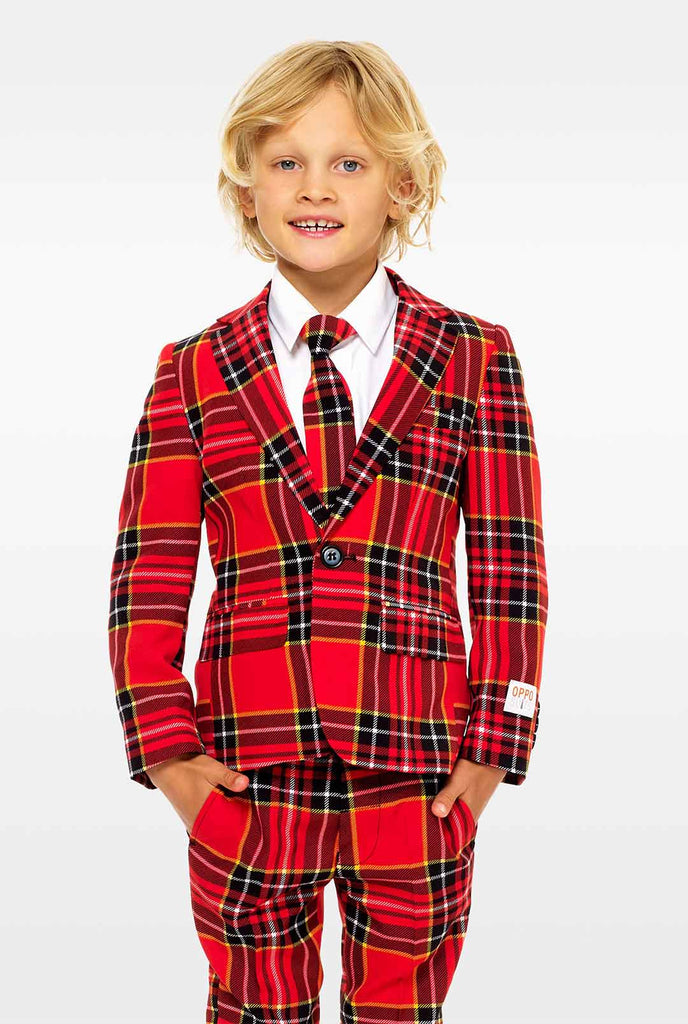 Red plaid suit for boys worn by boy