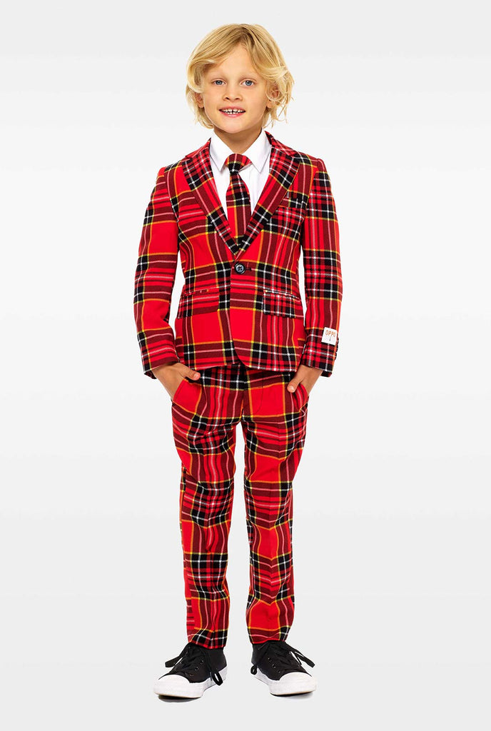 Red plaid suit for boys worn by boy