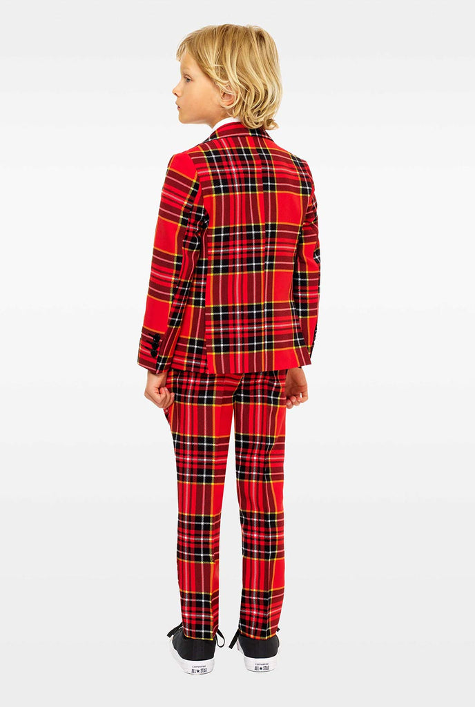 Red plaid suit for boys worn by boy