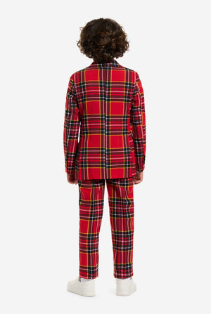 Person wearing a red plaid outfit on a white background