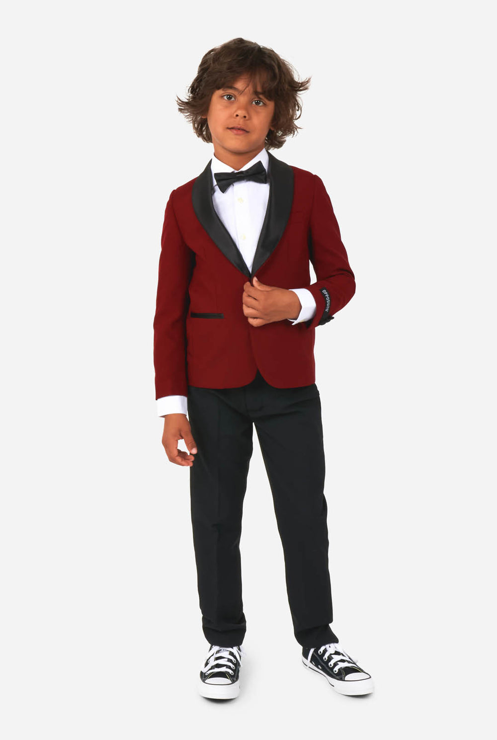 Kid wearing red and black tuxedo