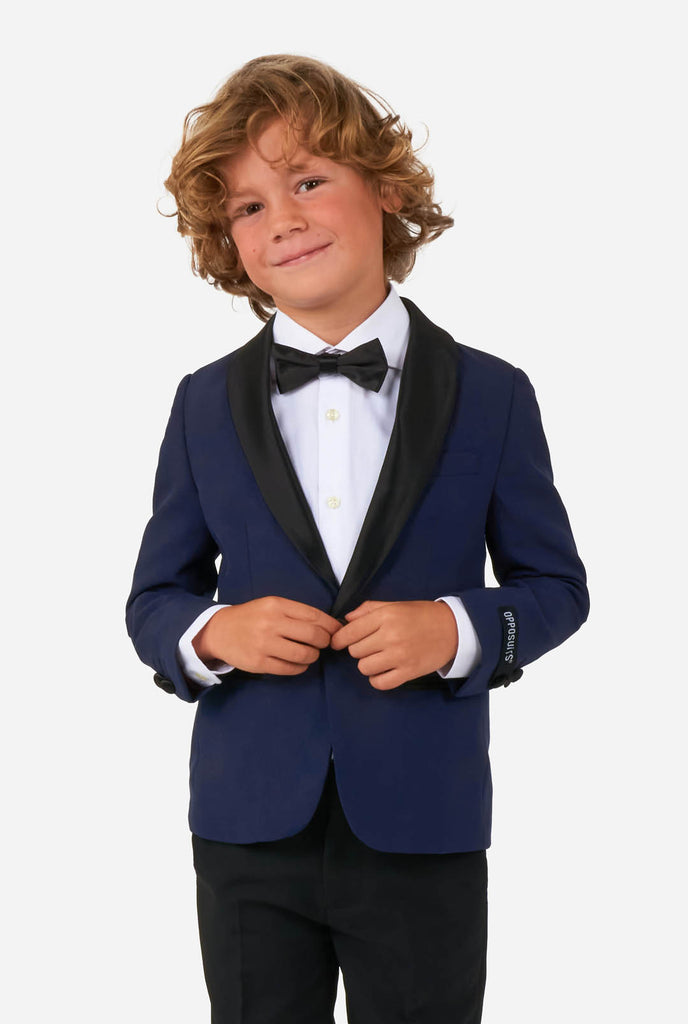Kid wearing blue and black tuxedo