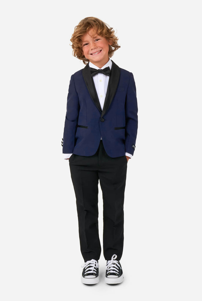Kid wearing blue and black tuxedo