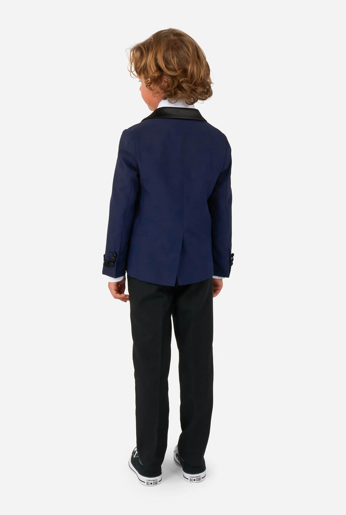 Kid wearing blue and black tuxedo