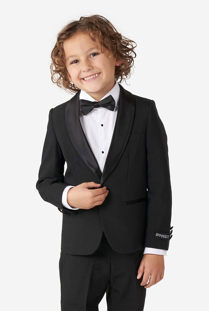 Kid wearing black tuxedo