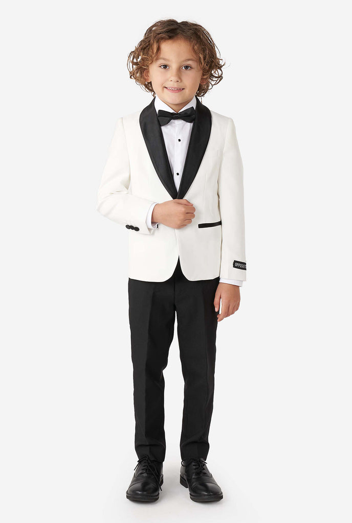 Kid wearing white and black tuxedo