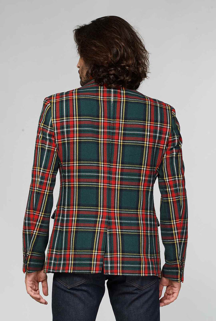 Red and green tartan blazer worn by man