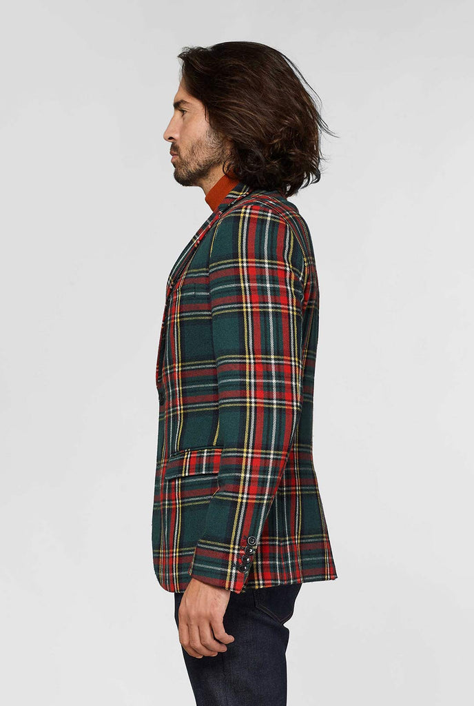 Red and green tartan blazer worn by man