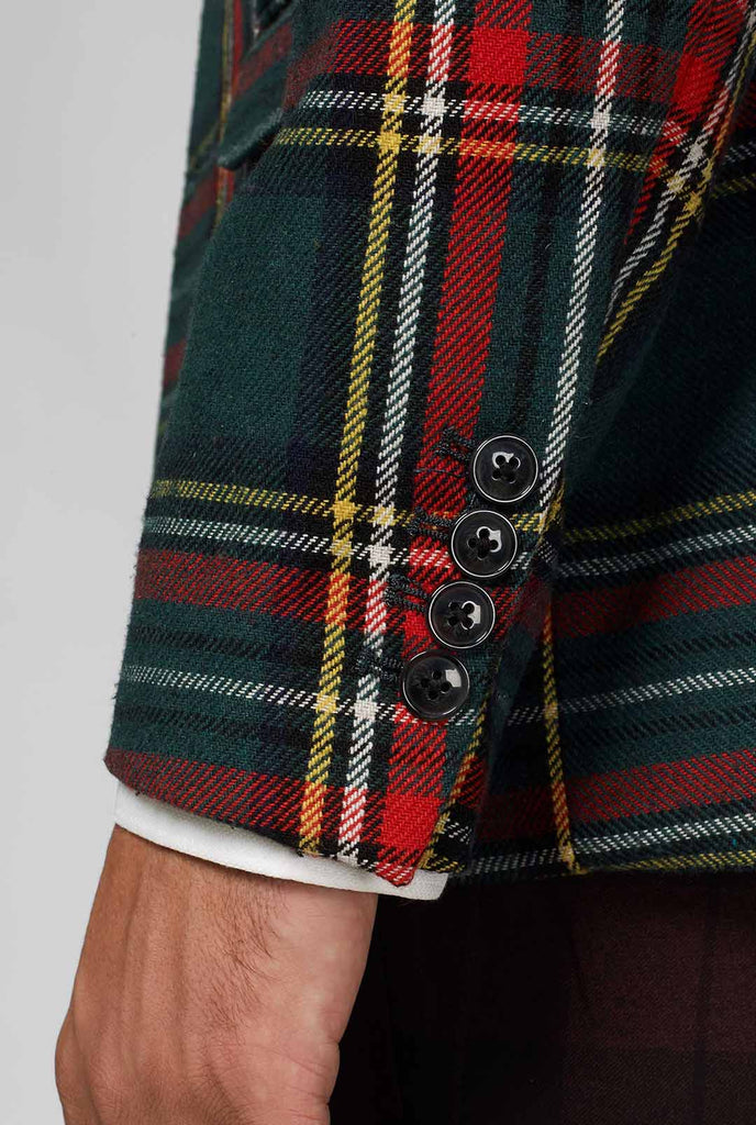 Red and green tartan blazer worn by man