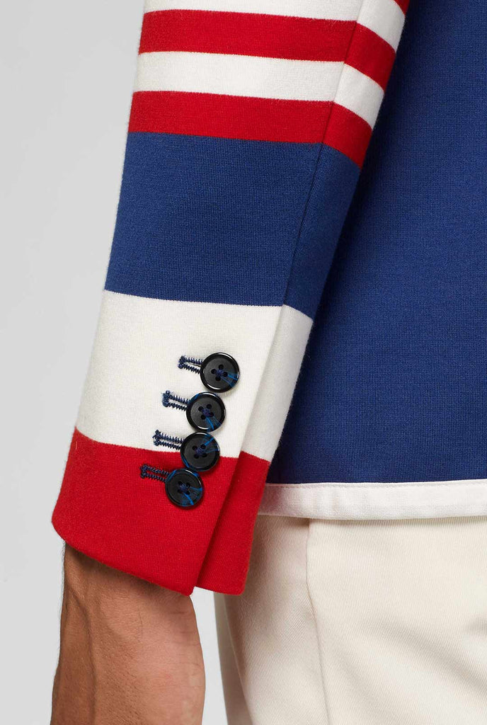 Red white and blue sporty casual blazer worn by man