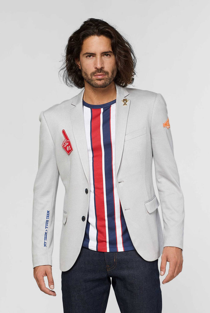 Grey sportswear casual blazer with sports patches worn by man