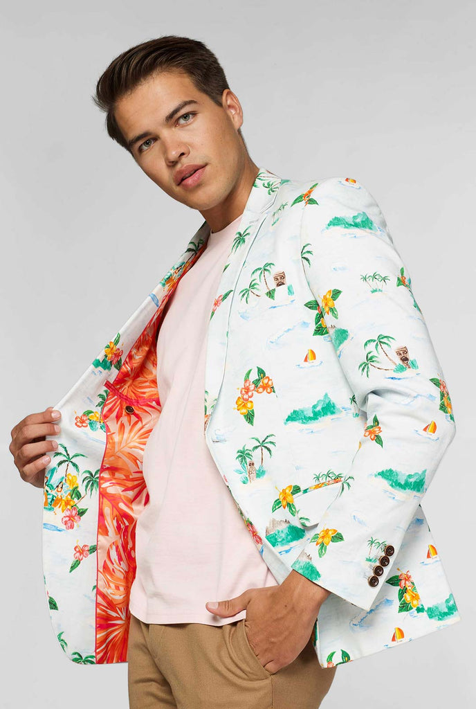 White casual blazer with Hawaiian icon print worn by man showing red palm tree inner lining