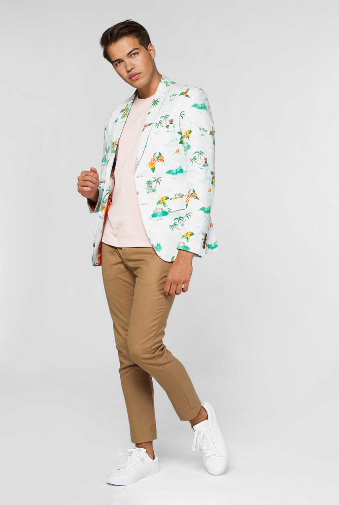 White casual blazer with Hawaiian icon print worn by man showing red palm tree inner lining