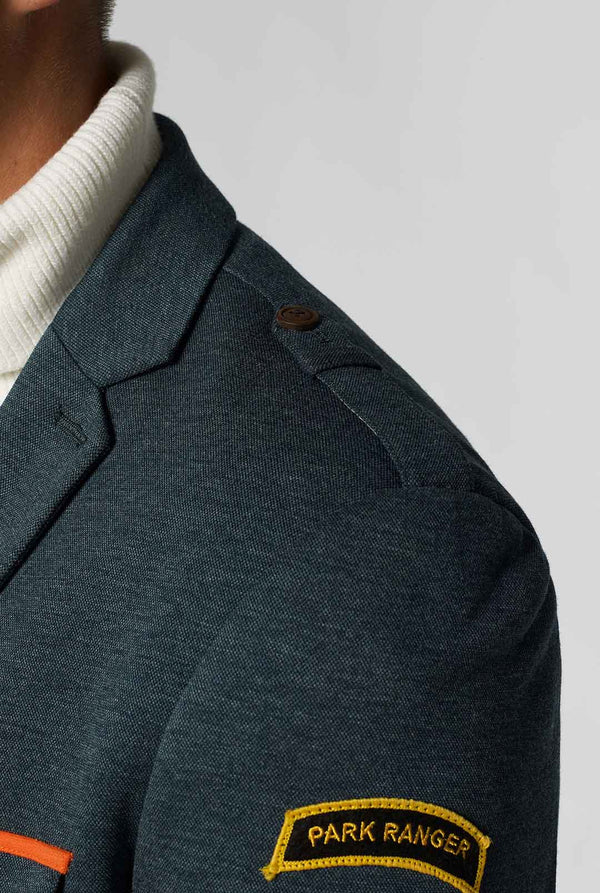 Green park ranger jacket worn by man