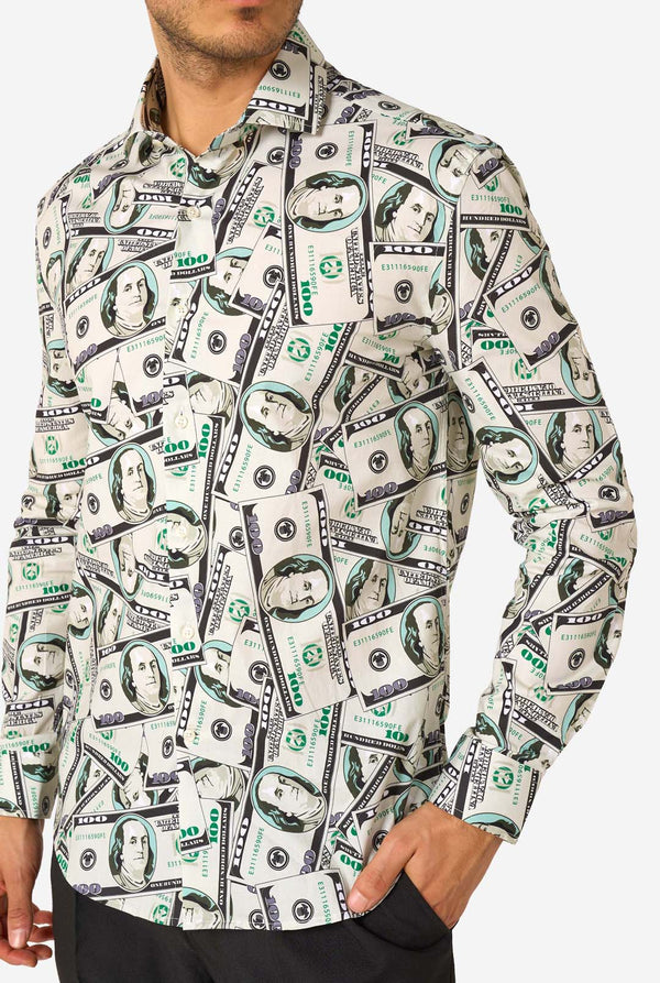 Man wearing a shirt with dollar bill print on a white background. Close up of the chest