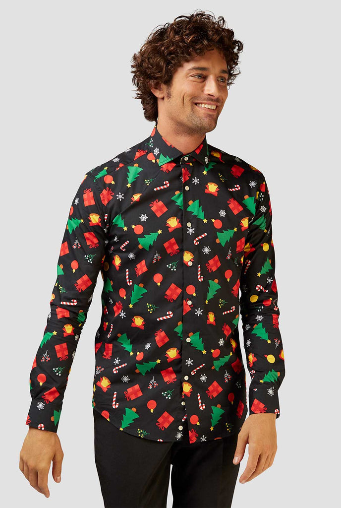 Man wearing black dress shirt with Christmas icons