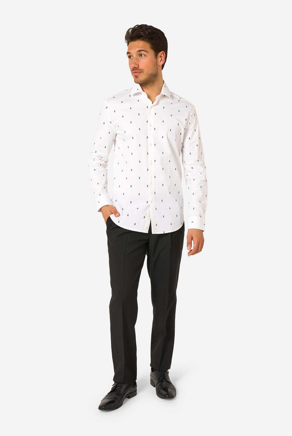 Man wearing a white shirt with a subtle Christmas tree pattern on a white background. Full body image