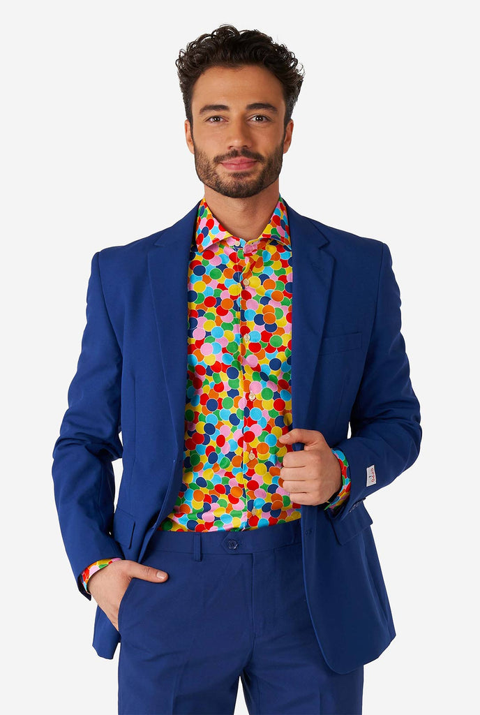 Man wearing multi color dress shirt with confetti print