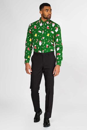 Man wearing green Christmas dress shirt with Christmas icons