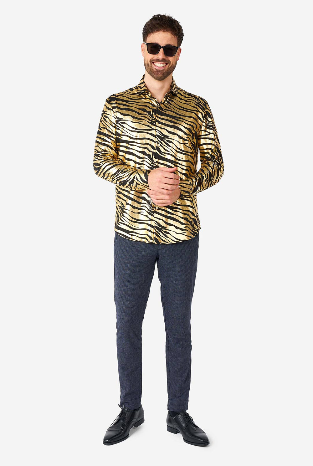 Man wearing golden dress shirt with tiger stripes