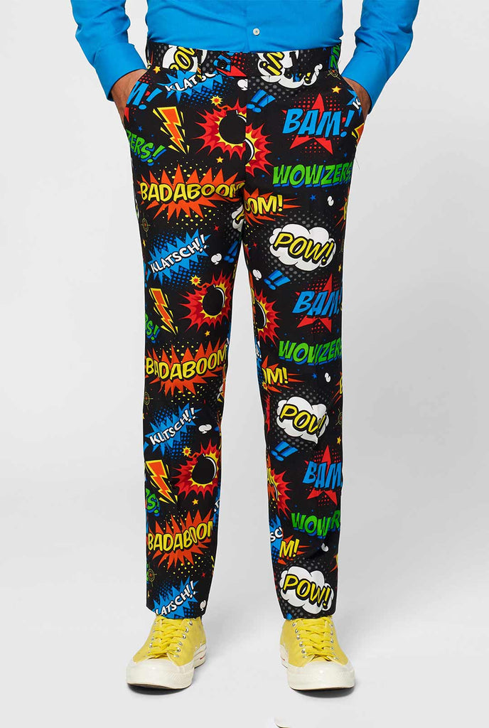 Black men's suit with comic book icons print worn by man