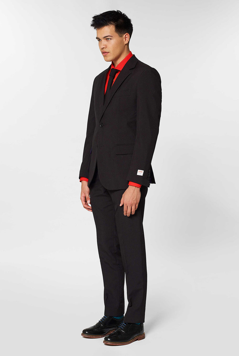 All black men's suit worn by man