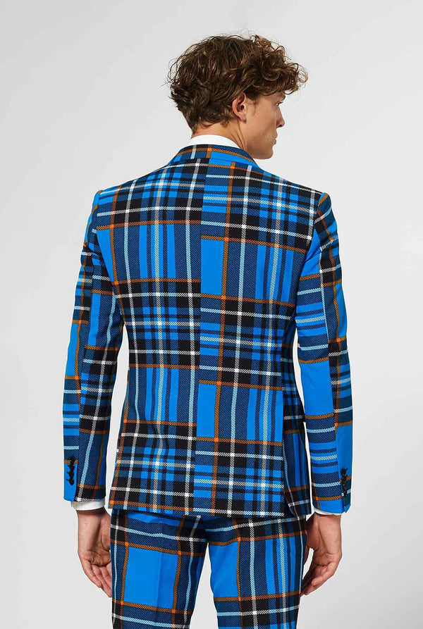 Man wearing blue tartan men's suit 