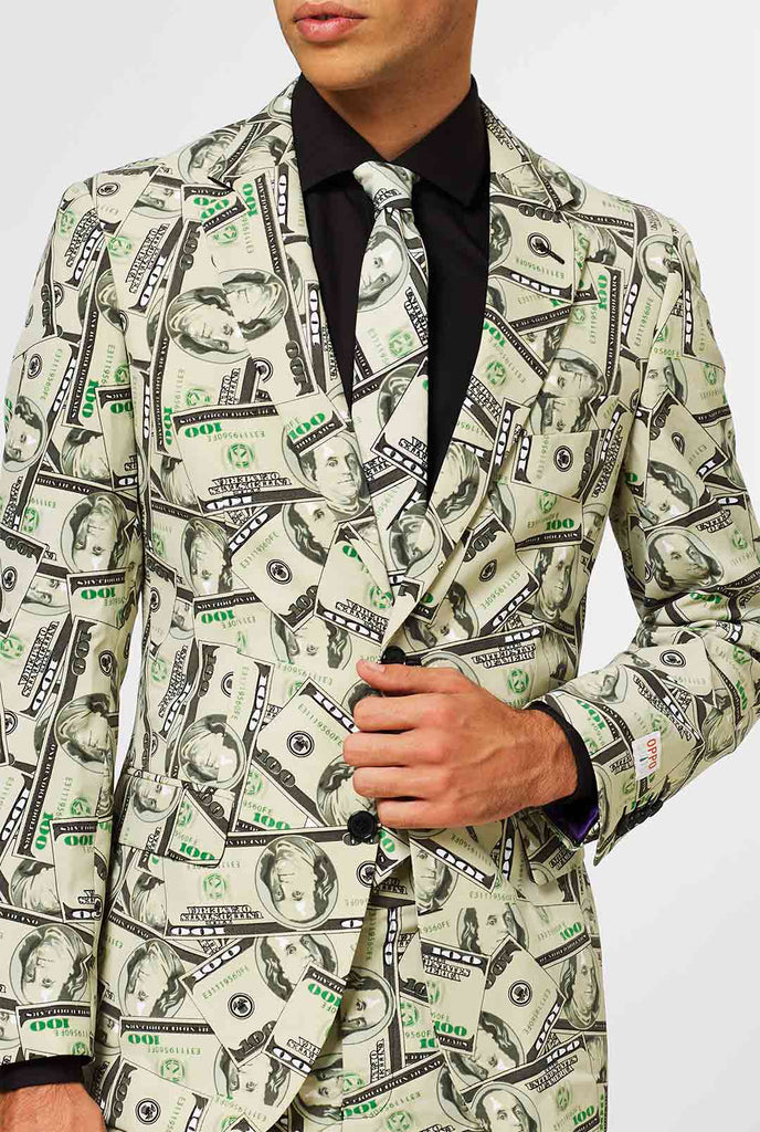 Man wearing men's suit with dollar, money print