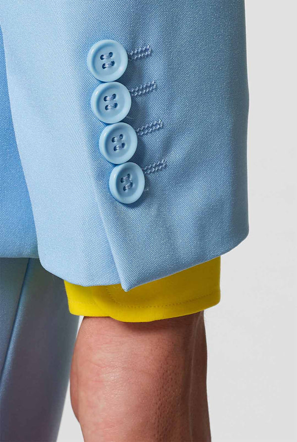 Man wearing light blue men's suit and yellow dress shirt