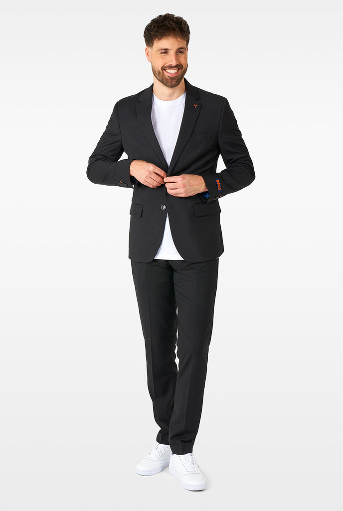 Man wearing casual black business suit