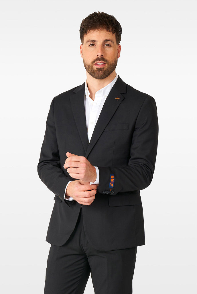 Man wearing casual black business suit