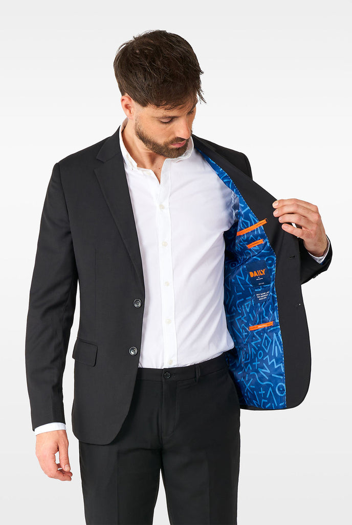 Man wearing casual black business suit