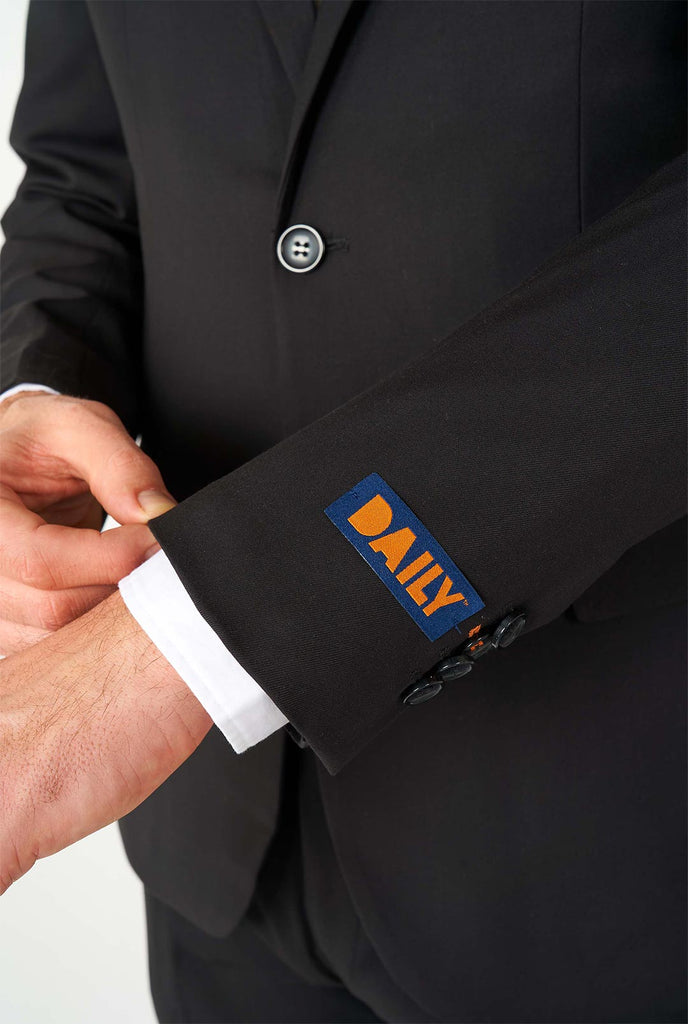 Man wearing casual black business suit