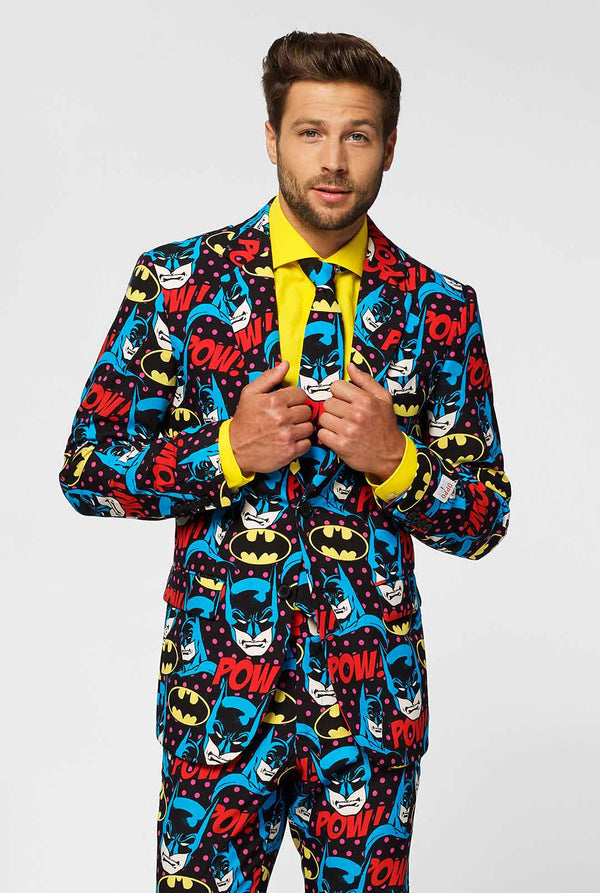 Batman themed men's suit with comic book icons worn by man