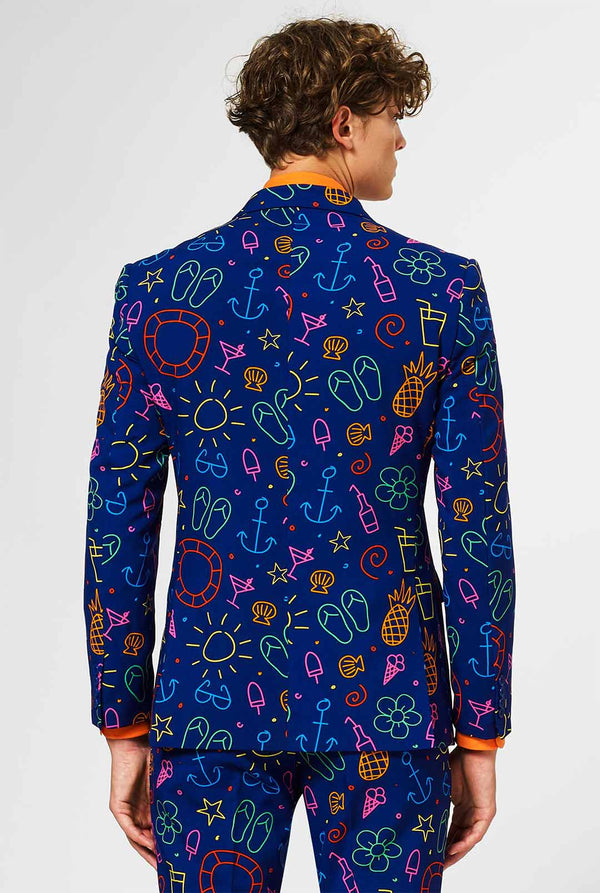 Dark blue men's suit with bright doodle iconography worn by man