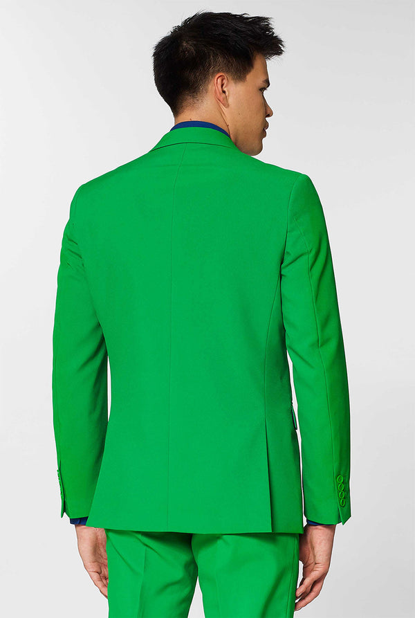 Man wearing green men's suit and dark blue dress shirt
