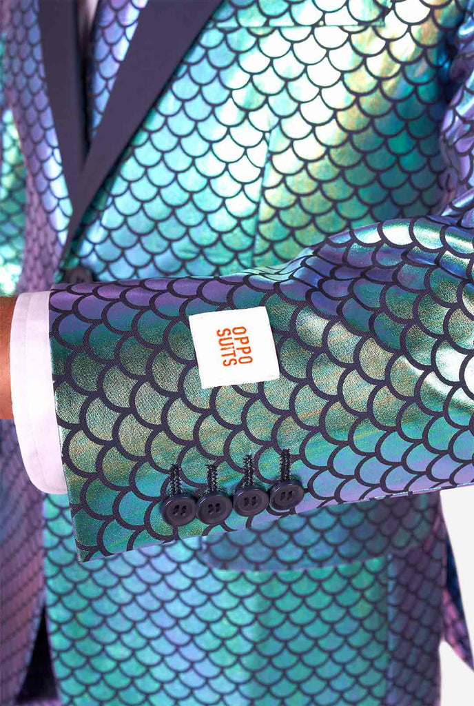 Man wearing blue fish scale motive suit