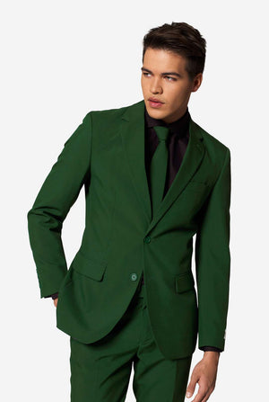 Stylish man wearing OppoSuits Glorious Green slim fit suit with black dress shirt and matching green tie — modern men’s formal wear.