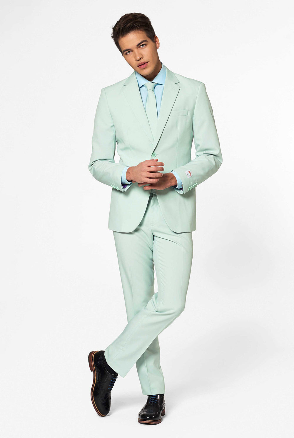 Man wearing pastel green colored men's suit