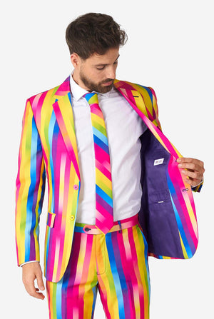 Man wearing rainbow-colored suit